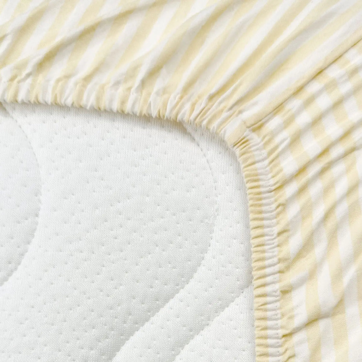 Drap-housse pour lit bébé en coton bio Kadolis - Rayé jaune