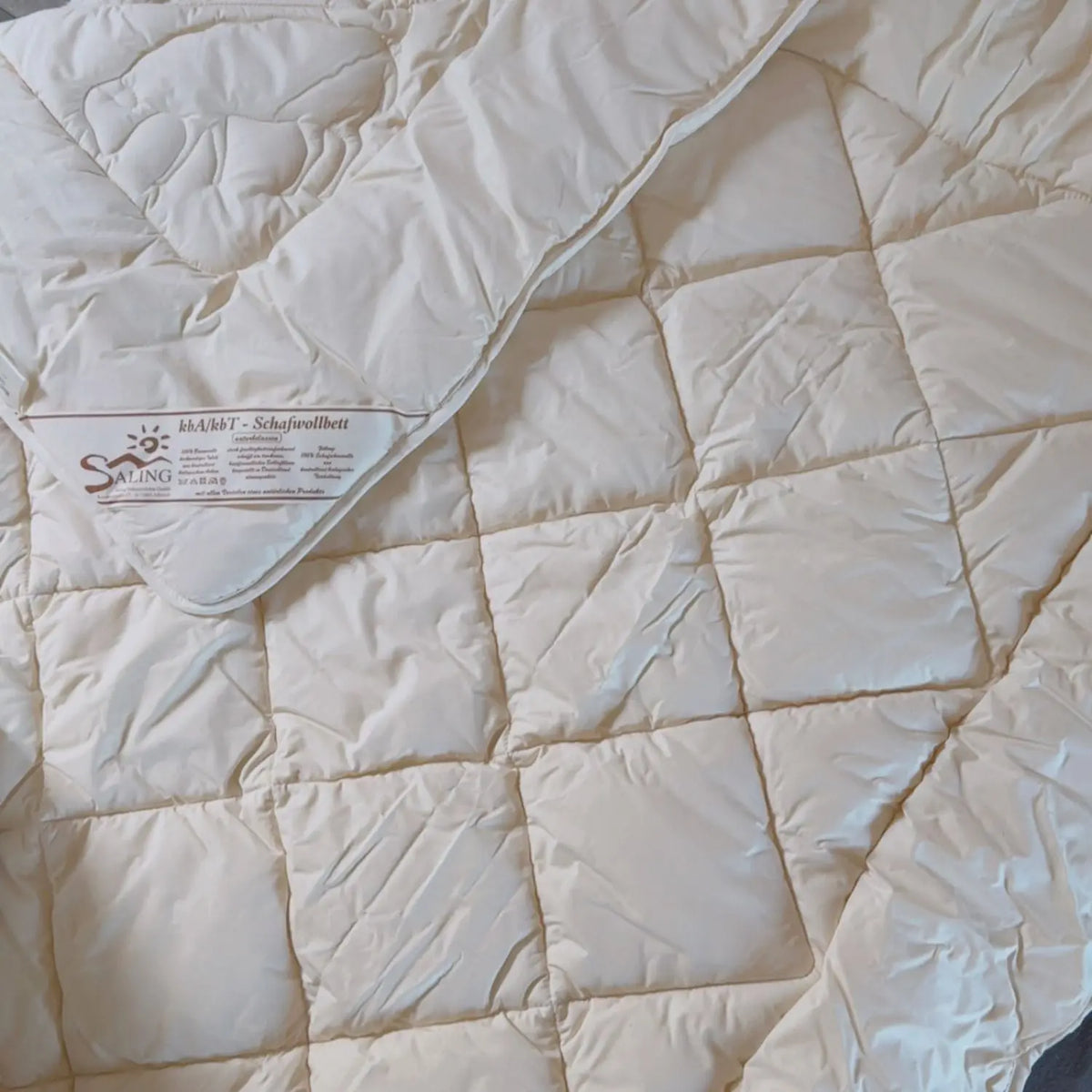 Couette matelassée MONO en laine de mouton bio Saling