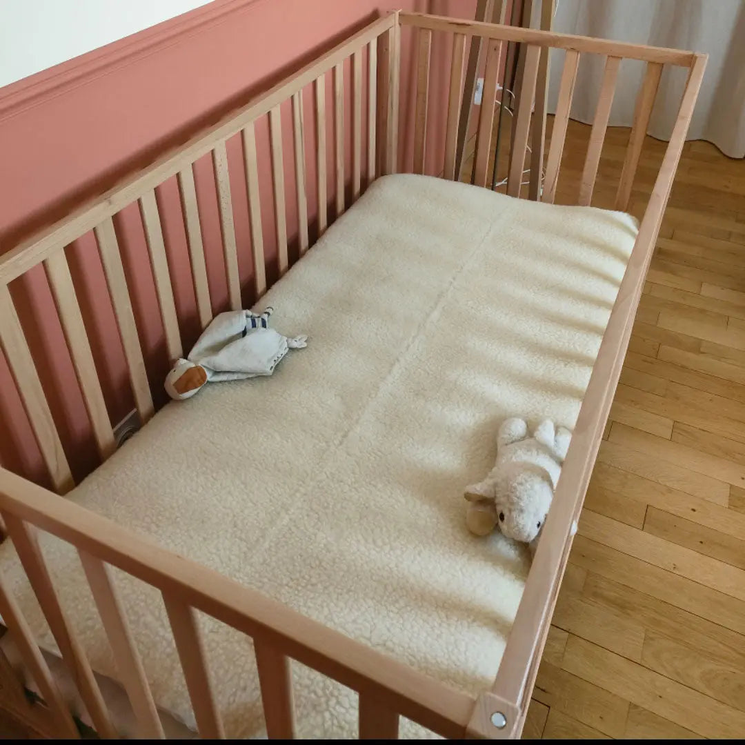 Protège matelas en laine vierge Sassoupi - 60x130cm
