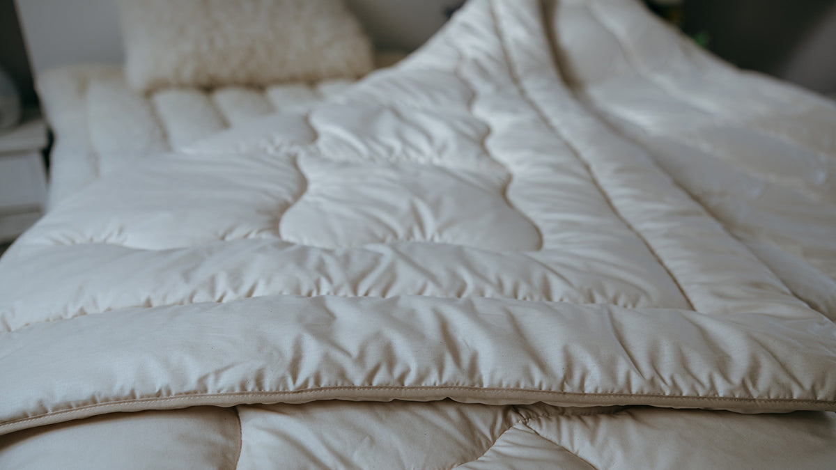 Couette en laine : comment bien choisir pour toute la famille ? Lilinappy