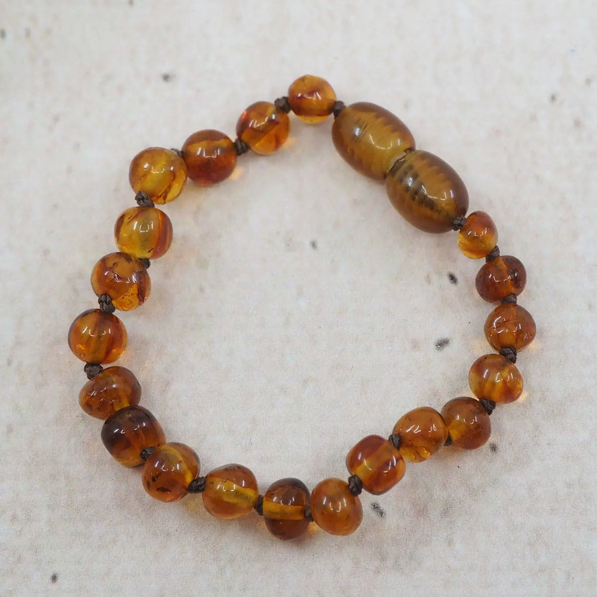 Bracelet d'ambre pour bébé - Cognac 