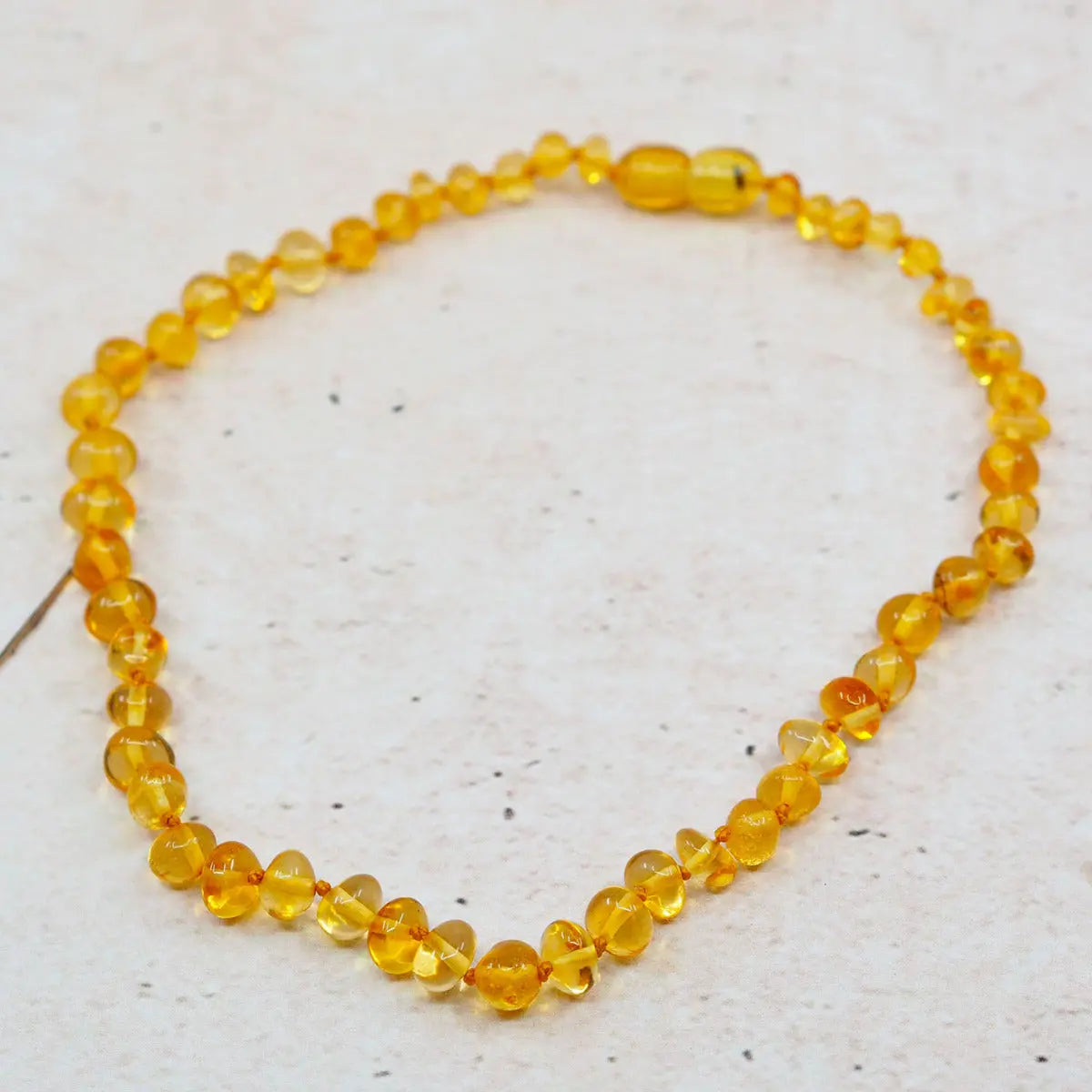 Collier d'ambre pour bébé Baroque Honey