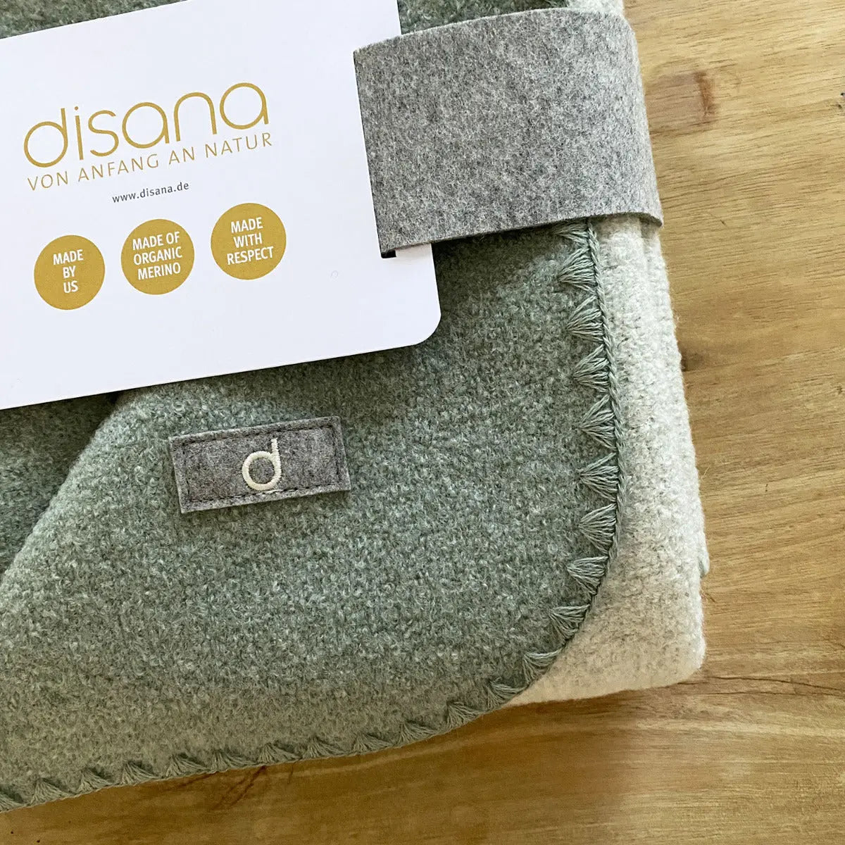 Couverture bébé double face en laine bouillie Disana – Jade 