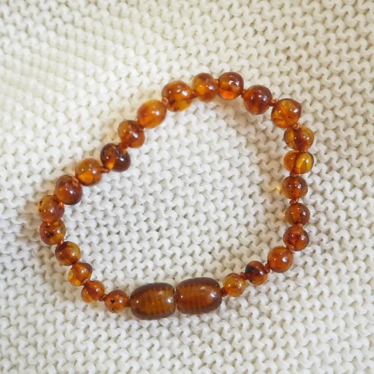 Bracelet d'ambre bébé cognac pour bébé