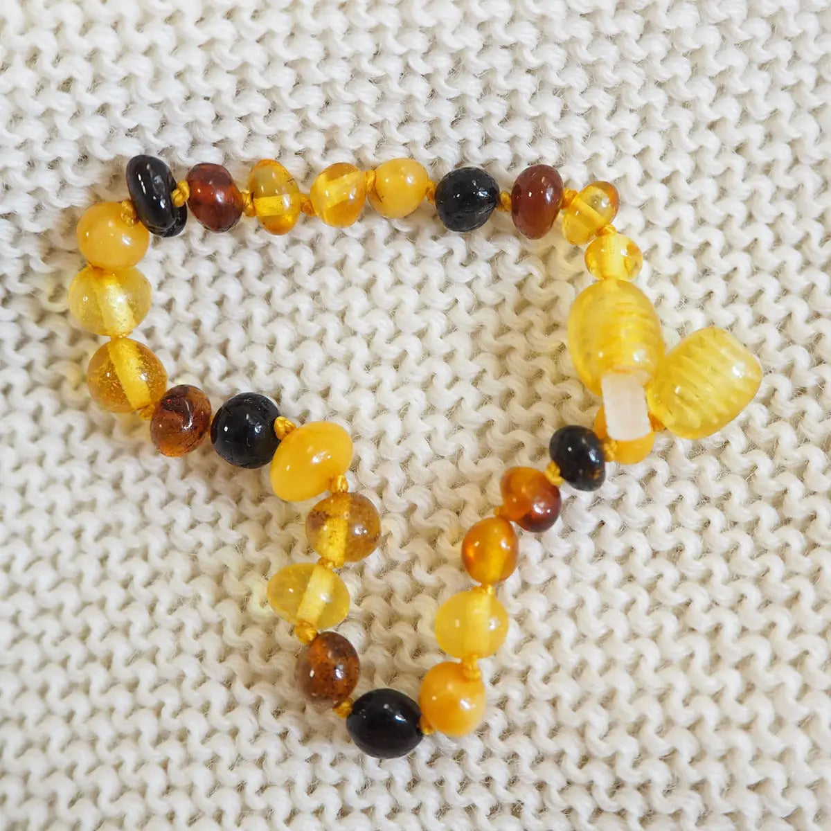 Bracelet d'ambre pour bébé - multicolore - Lilinappy
