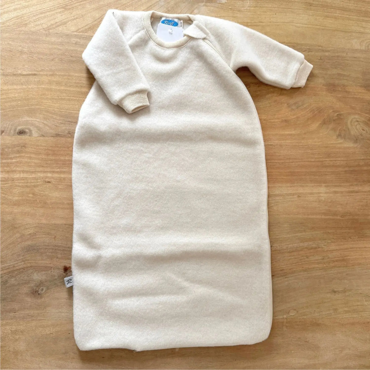 Gigoteuse bébé à manches en polaire de laine mérinos bio Reiff – Naturel