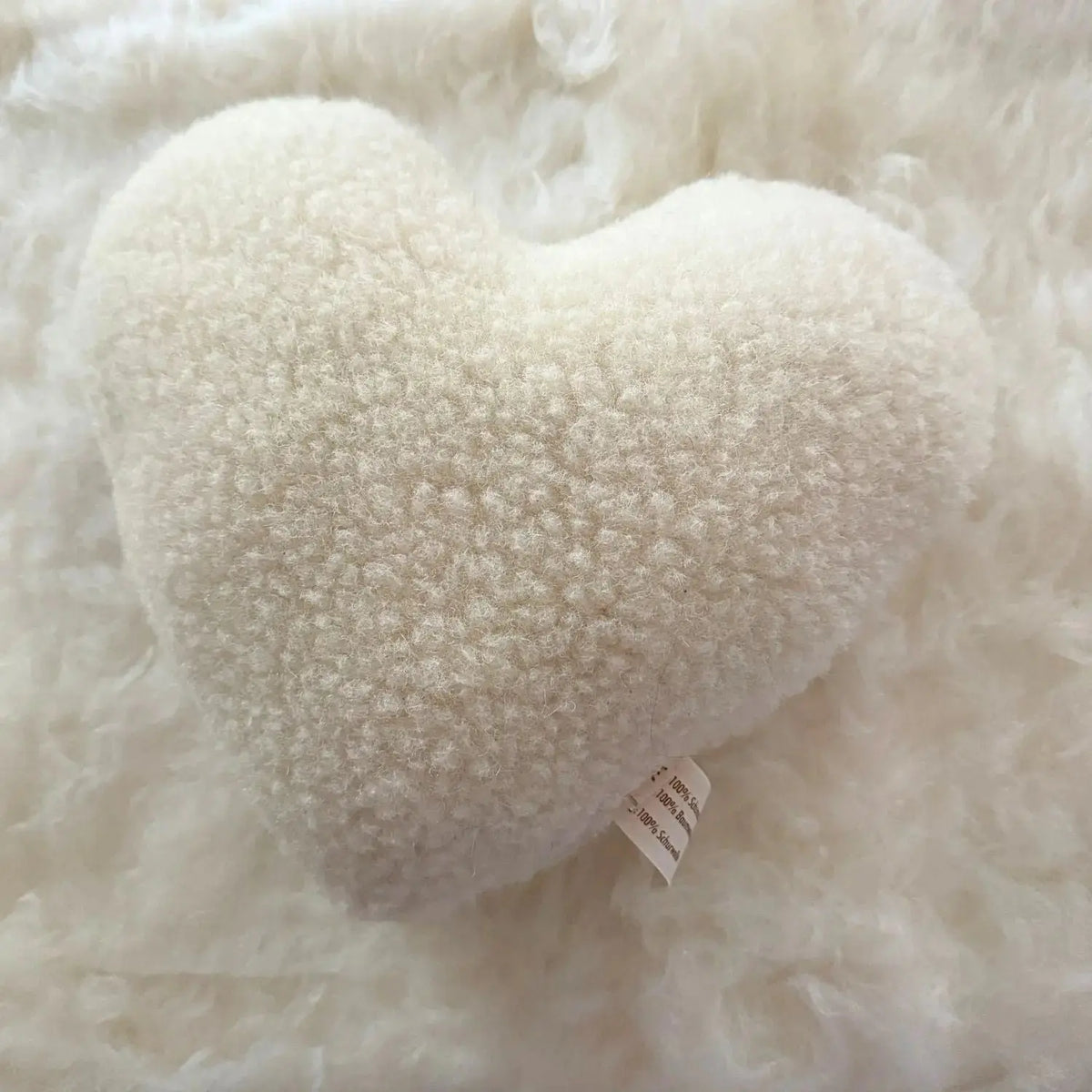 Coussin cœur en laine vierge Sassoupi 