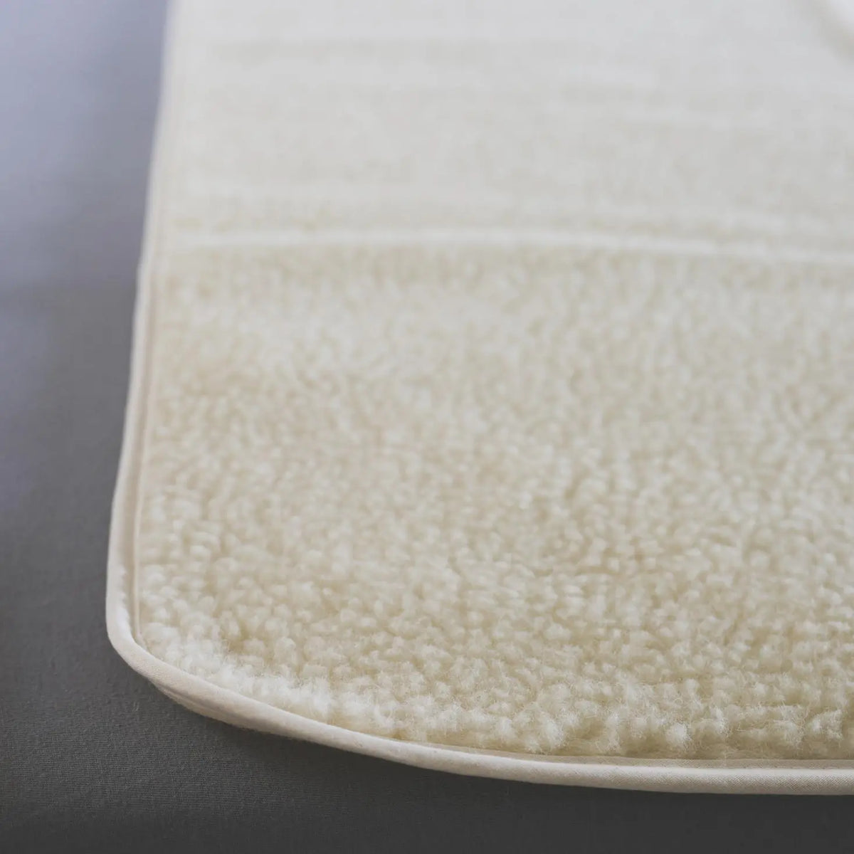 Protège matelas en laine vierge Sassoupi - 90x190 cm 