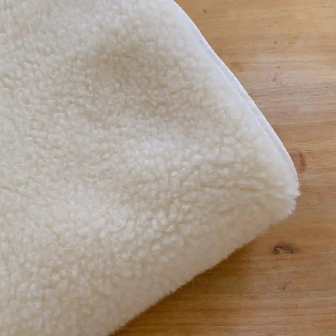 Protège matelas en laine vierge Sassoupi - 70x140cm 