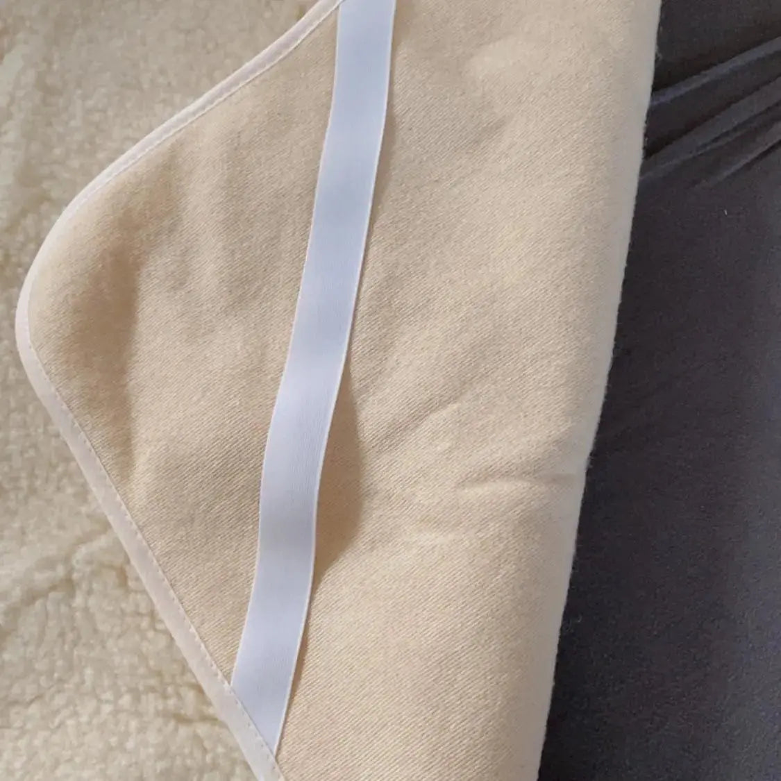 Protège matelas en laine vierge Sassoupi - 70x140cm 