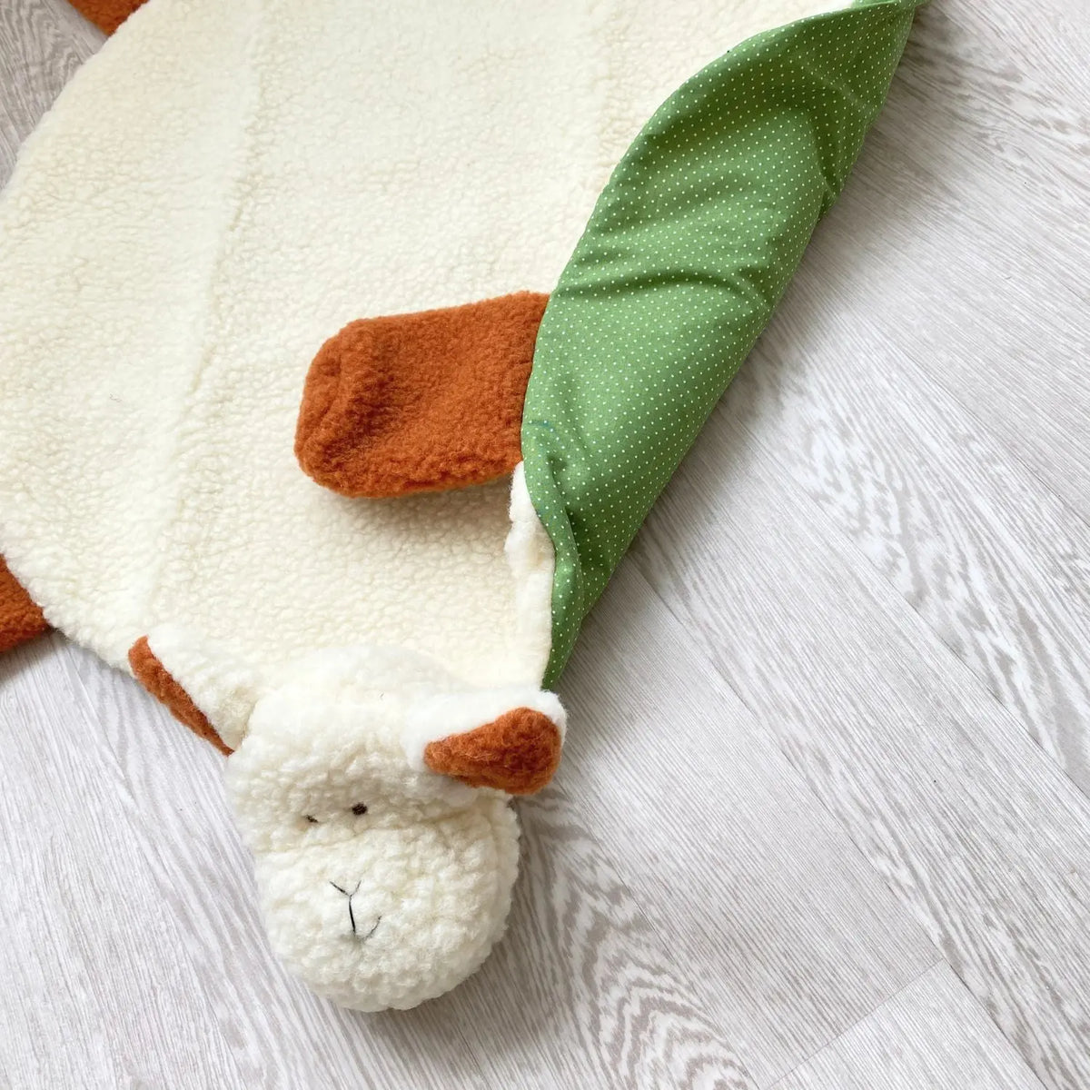 Tapis d'éveil en laine et coton Sassoupi 